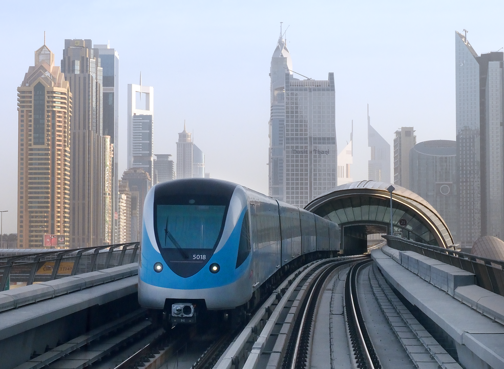 A Dubai Metro train departing from Dubai Mall station